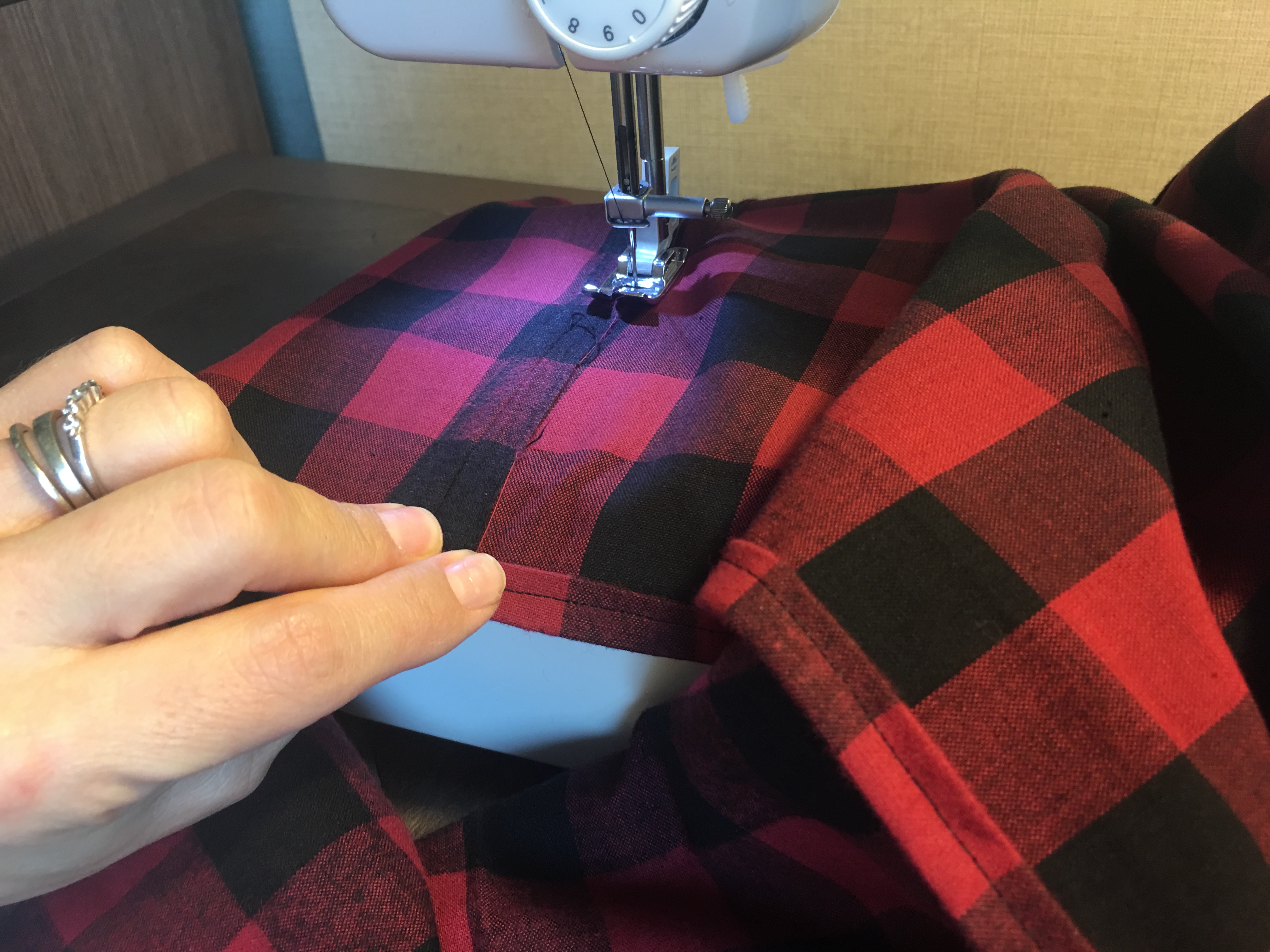 Finish the center seam by rolling the edge and stitching down.